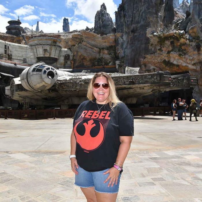 Blogging Molly in front of the Millenium Falcon